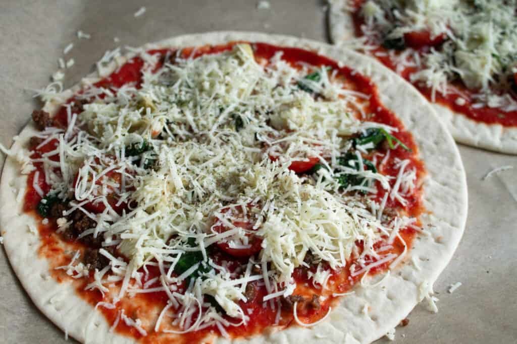 pizzas going into the oven